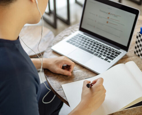 Online Studying Concept A Black Haired Student Doing His Homewor